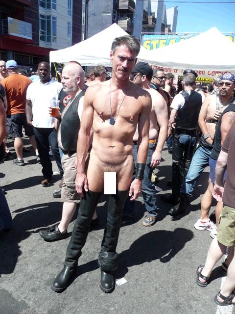 Another naked guy on San Francisco streets Up Your Alley attendee poses in