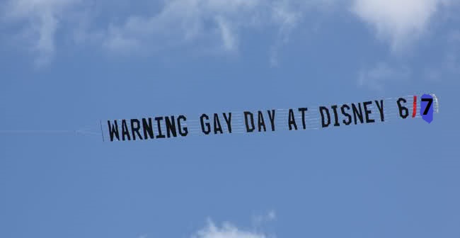 http://americansfortruth.com/uploads/2014/05/Gay-Day-Disney-flying-banner-altered-6-7-14.jpg