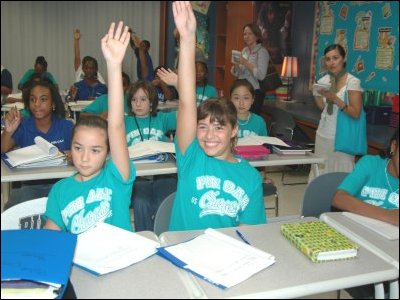 students_raising_hands.jpg