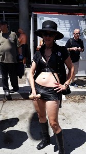 This is a woman, pretending she is a man, using a fake penis. This was shot a recent deviant street fair in San Francisco. The LGBTQueer activist movement is more committed than ever to promoting gender confusion, even to young children in schools.