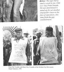 The "Gay" Agenda's Radical Roots: One-time Communist Harry Hay first envisioned the notion of "homosexuals" comprising a sexual "minority" as a means of winning acceptance and growing power. Here Hay is shown defending the right of the notorious pederasty group NAMBLA (North American Man/Boy Love Association) to march in an early Los Angeles "gay pride" parade.