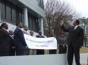 Wooden_SPLC Press Conference_sign_pastors