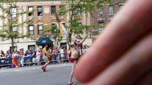 Gay Bully-Censor: At the right of this photo are the fingers of the hand of the intolerant homosexual bully who harassed me while I was observing New York City "pride." 