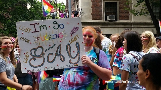 More Profanity: Lesbian holds up her sign, "I'm So [F-cking] Gay," at the New York City "Pride" parade. Should children be taken to this event?