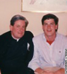 Roberts (right) shown with "Father" Jeff Toohey, the chaplain at his all-boys high schools who sexually abused him.